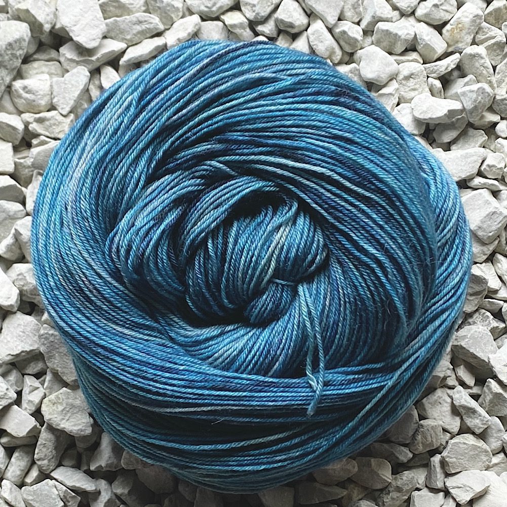 4-Ply hand dyed in 'Stormy Sky'. Story blues and greys