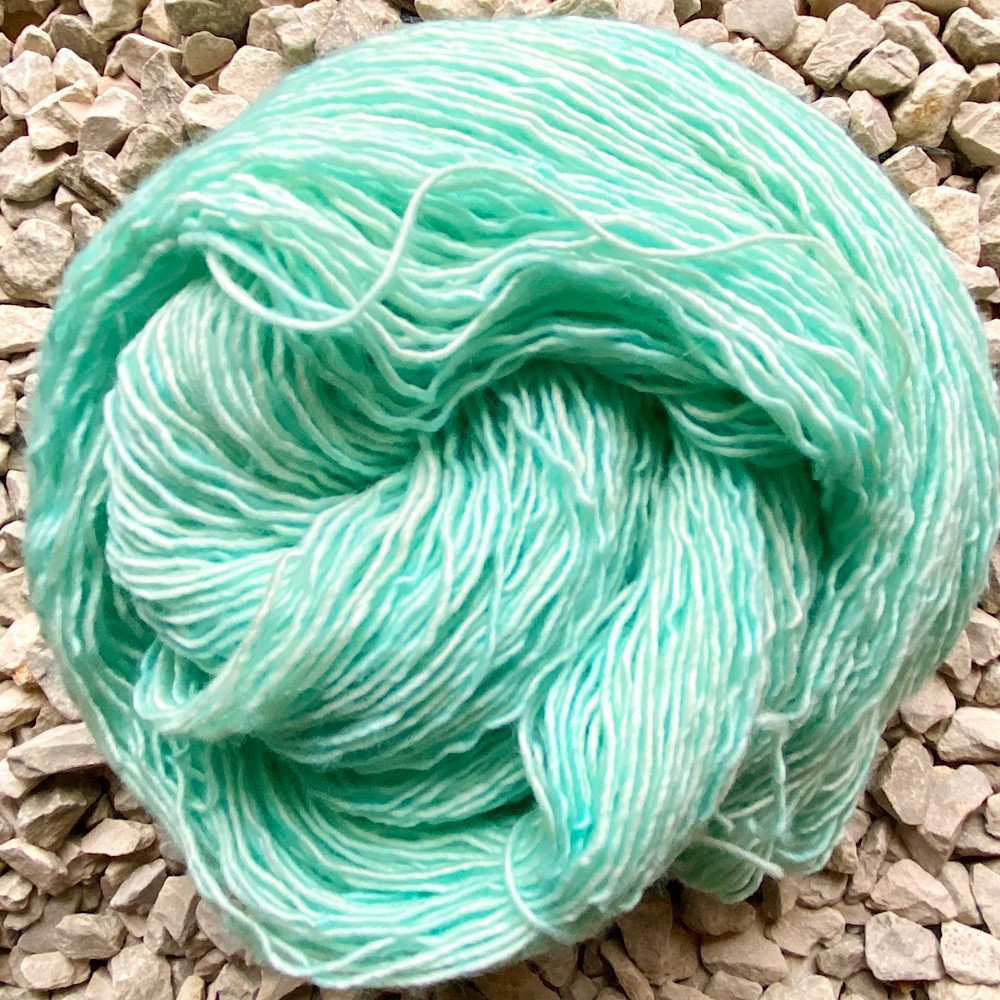 100% Merino wool hand dyed in Seaglass. A delicate mis of pale to mid greens.