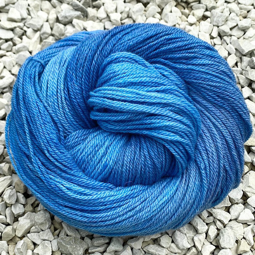 Swirl of Double Knit yayn to show tones of blue in 'Hebridean Blue