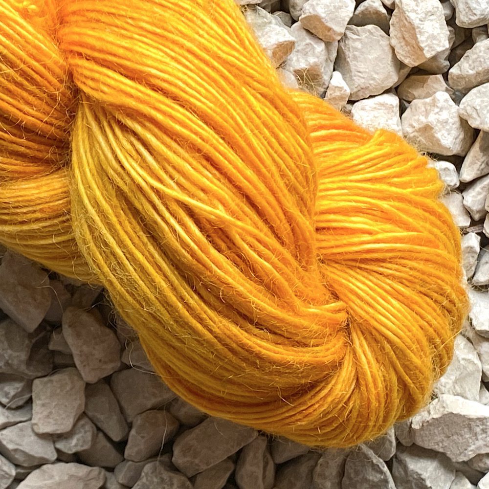 Merino/Mohair hand dyed yarn in 'Mellow', a blend of pale to light mustard toned yellows