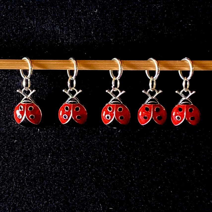 Row of five Ladybird themed stitch markers