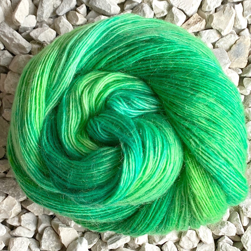 Photo of Merino/Mohair wool in colour 'Pixie' - pale to deep greens