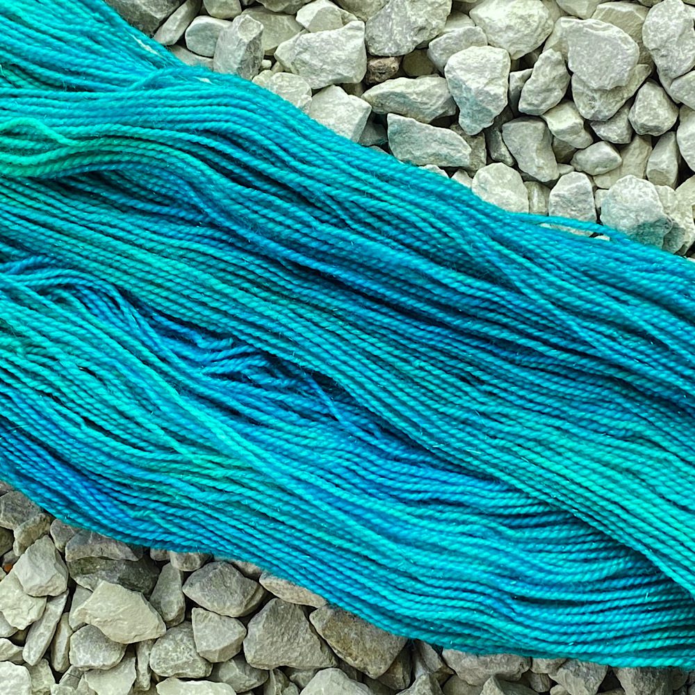 Sea Dreams Hand-dyed yarn shown flat