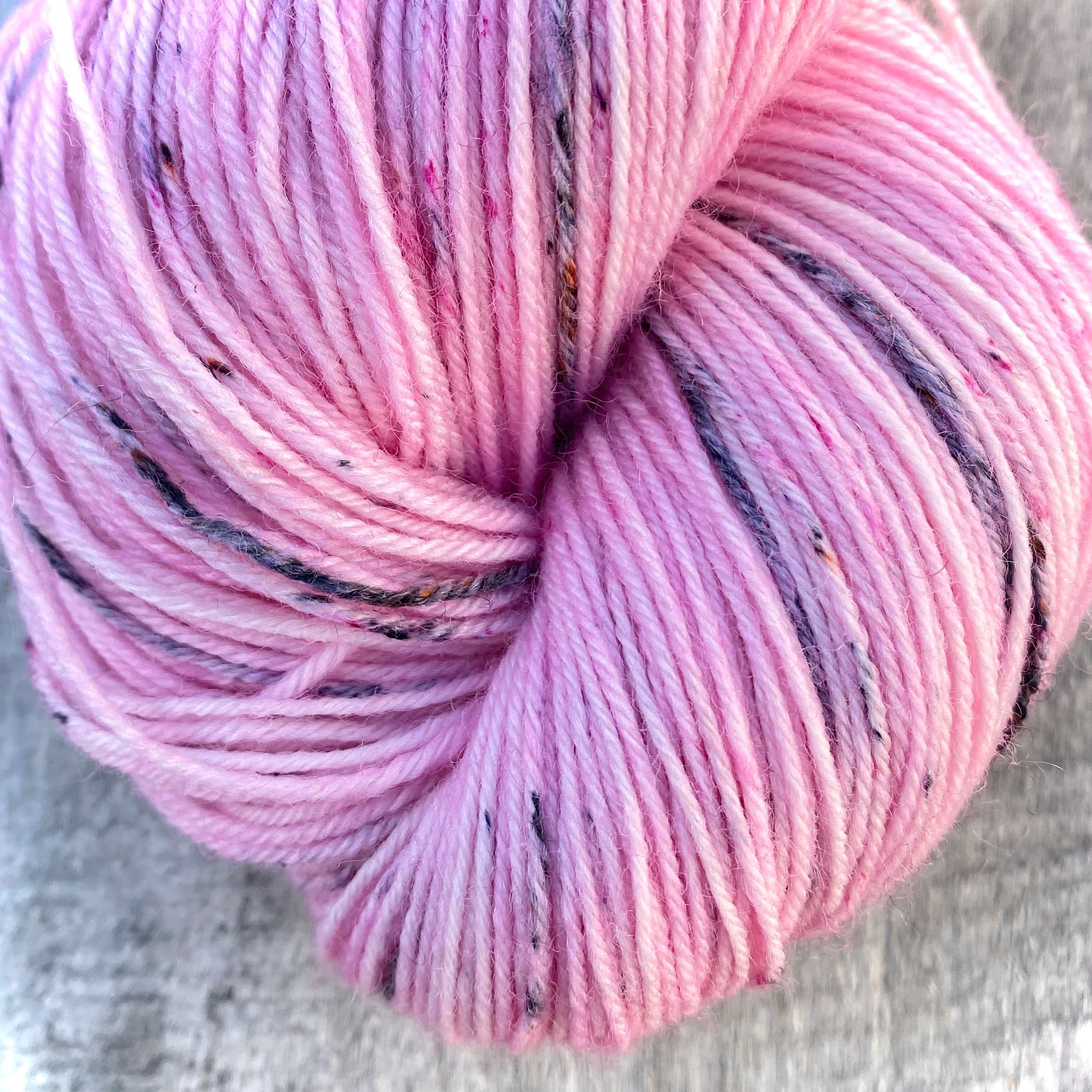 end of a skein of pink wool