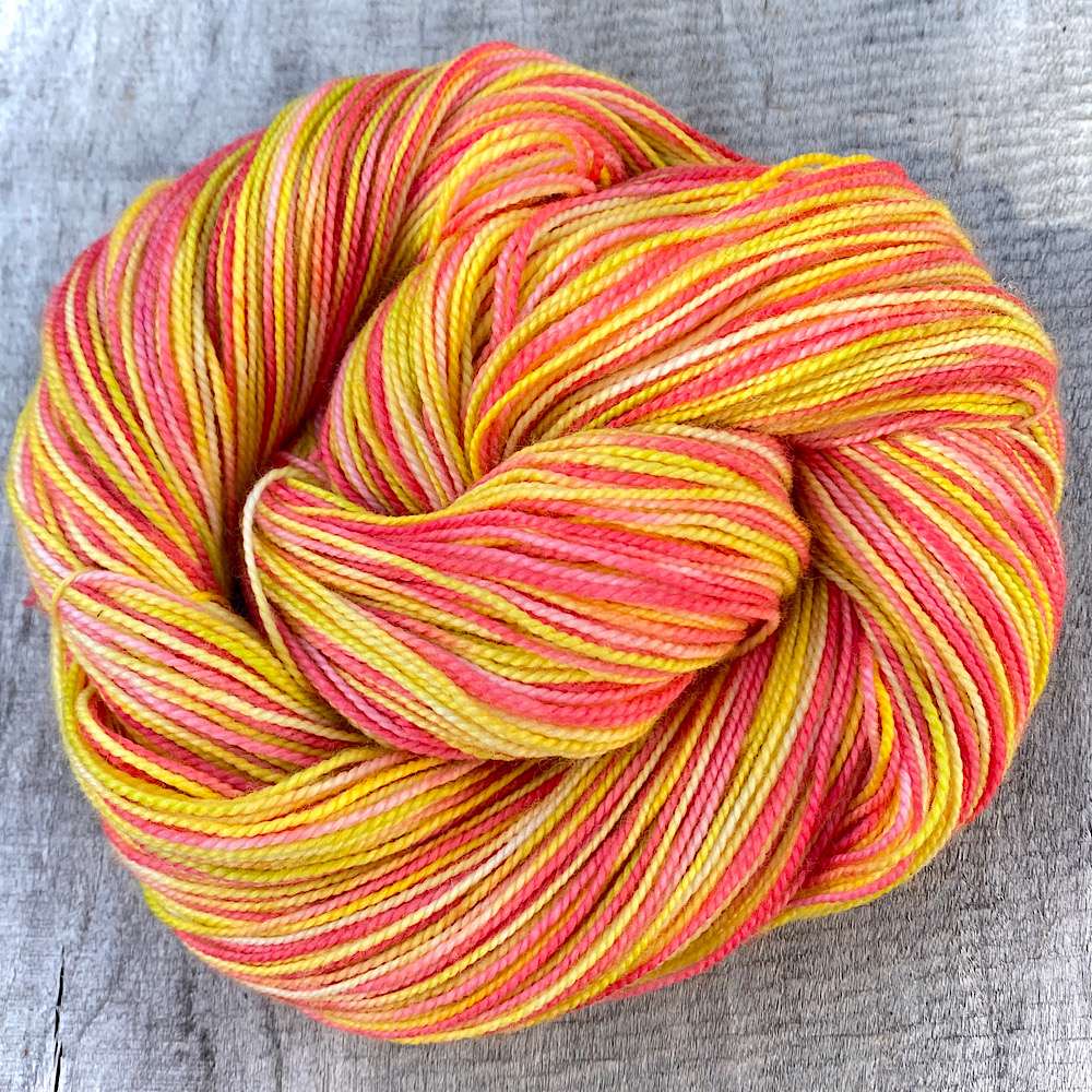 hand dyed yarn in citrus tones