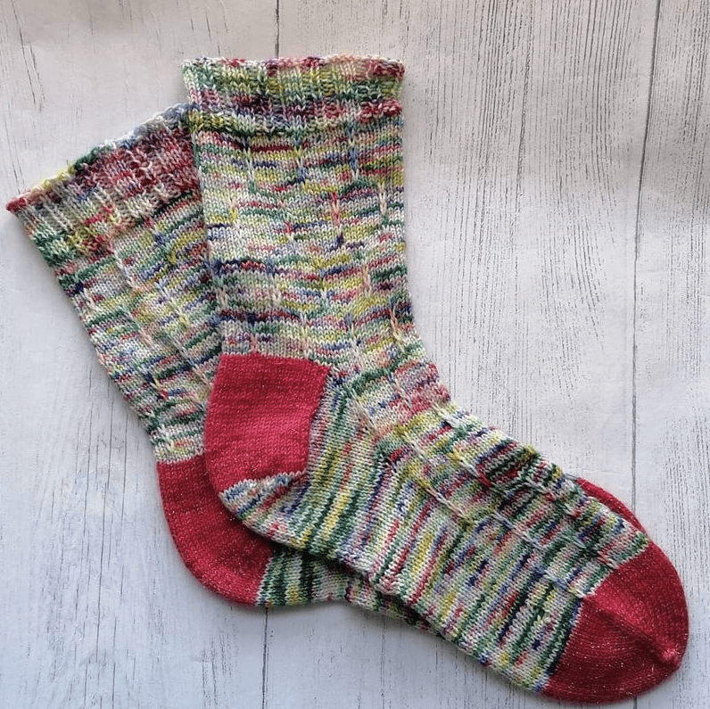 A pair of sock knitted with the knitting pattern